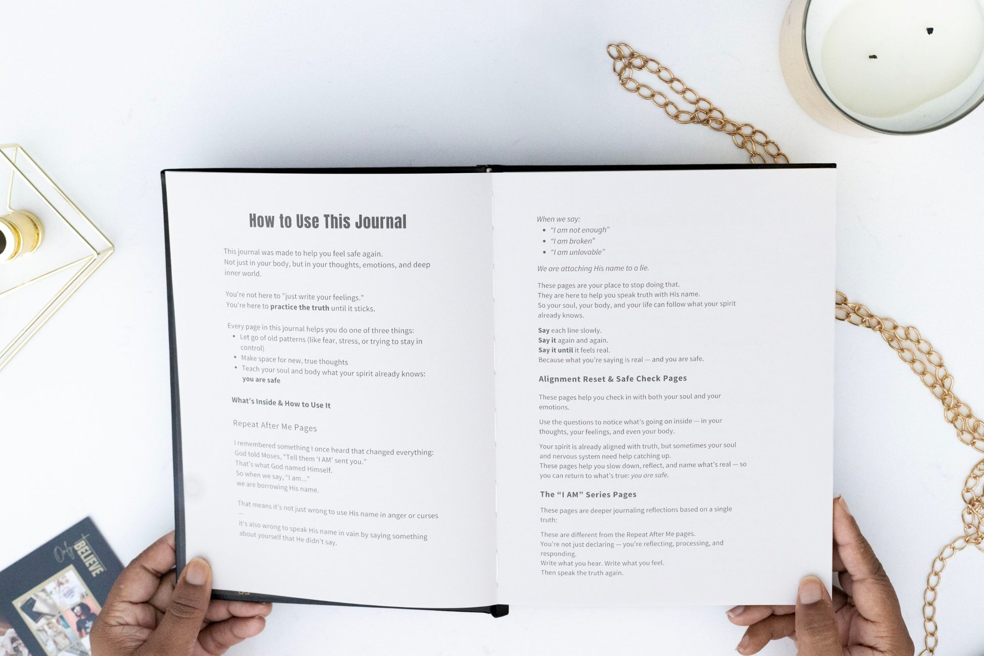 Open I AM SAFE  journal with instructions on a white surface with decorative items.
